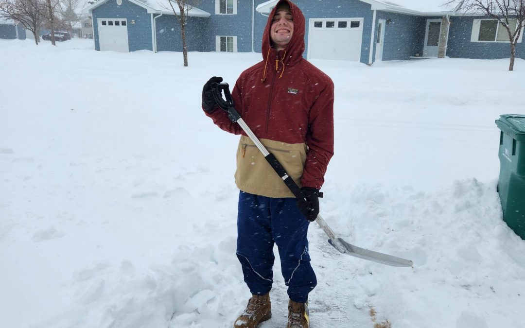 Snow Shoveling Airman Donates $350 to AFAS