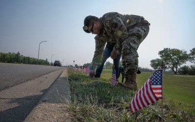 Airmen Place Flags in Remembrance of Those Lost to Suicide